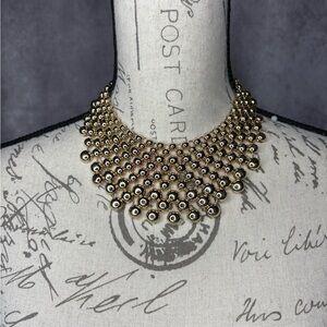Gold Statement Necklace with Intricate Collar Design